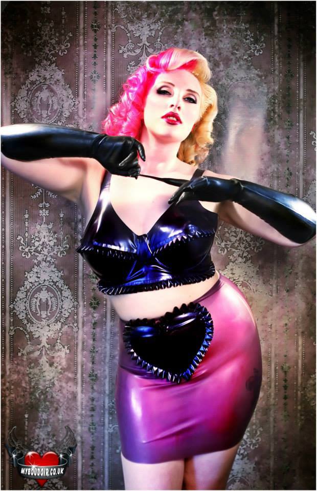 A metallic purple latex underwired bra with frill trim.
