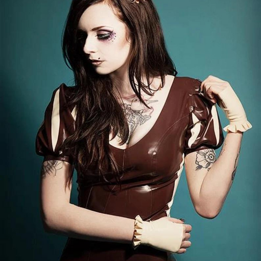 A pair of white latex fingerless gloves with frill trim detailing.