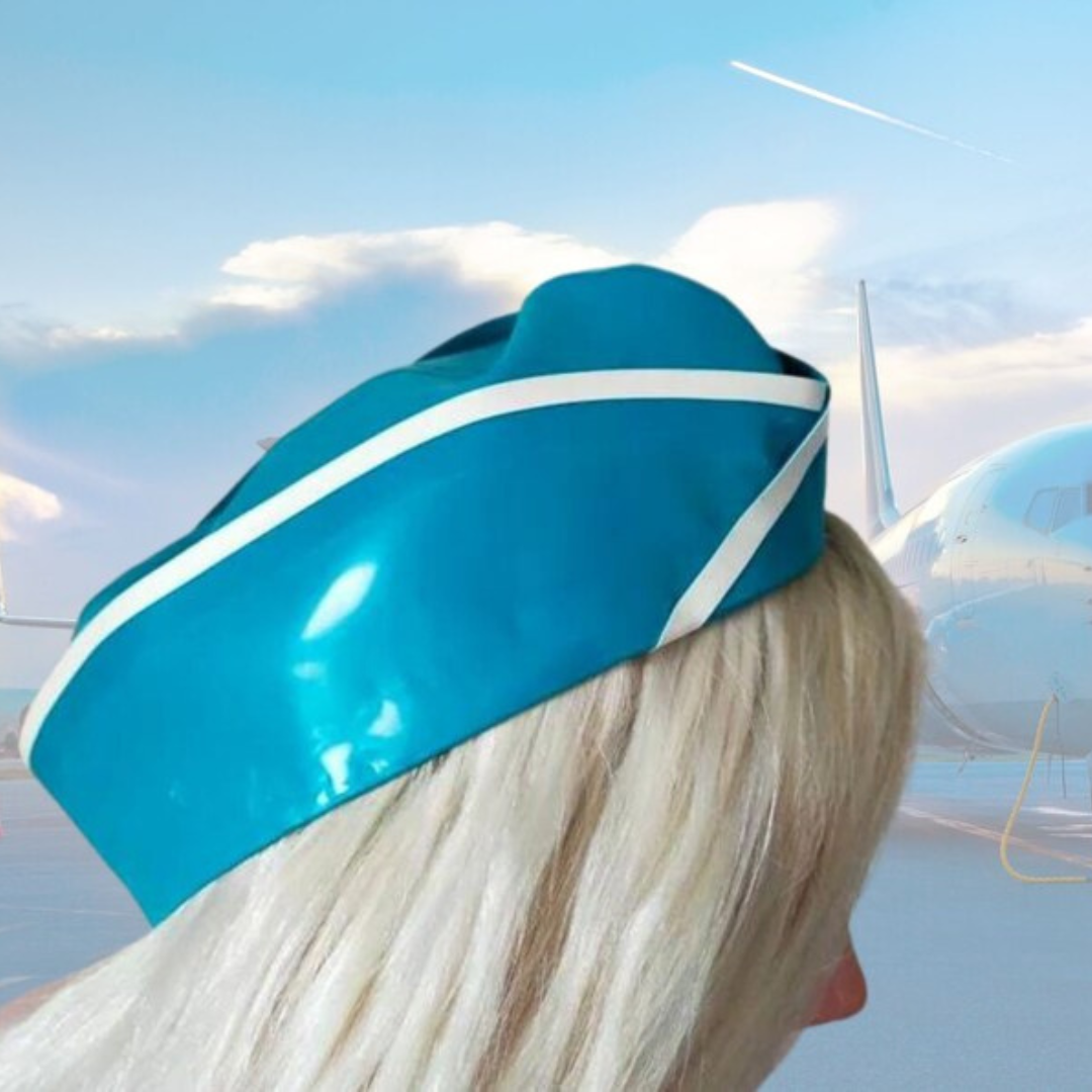 An aqua coloured latex airline side cap with white trim detail.