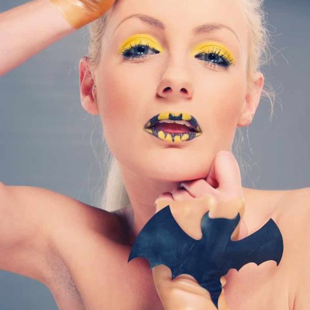 A pair of translucent natural latex bat gloves.