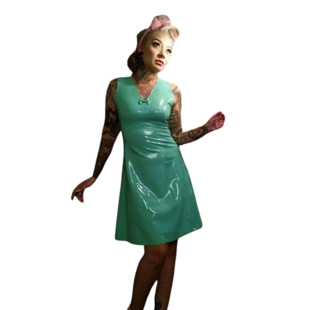 A jade green latex dress with bow detail on the V neckline.
