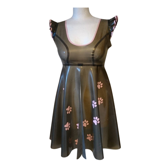 A translucent Smokey black latex nightie with frilled cap sleeves and baby pink trim and paw print appliques.