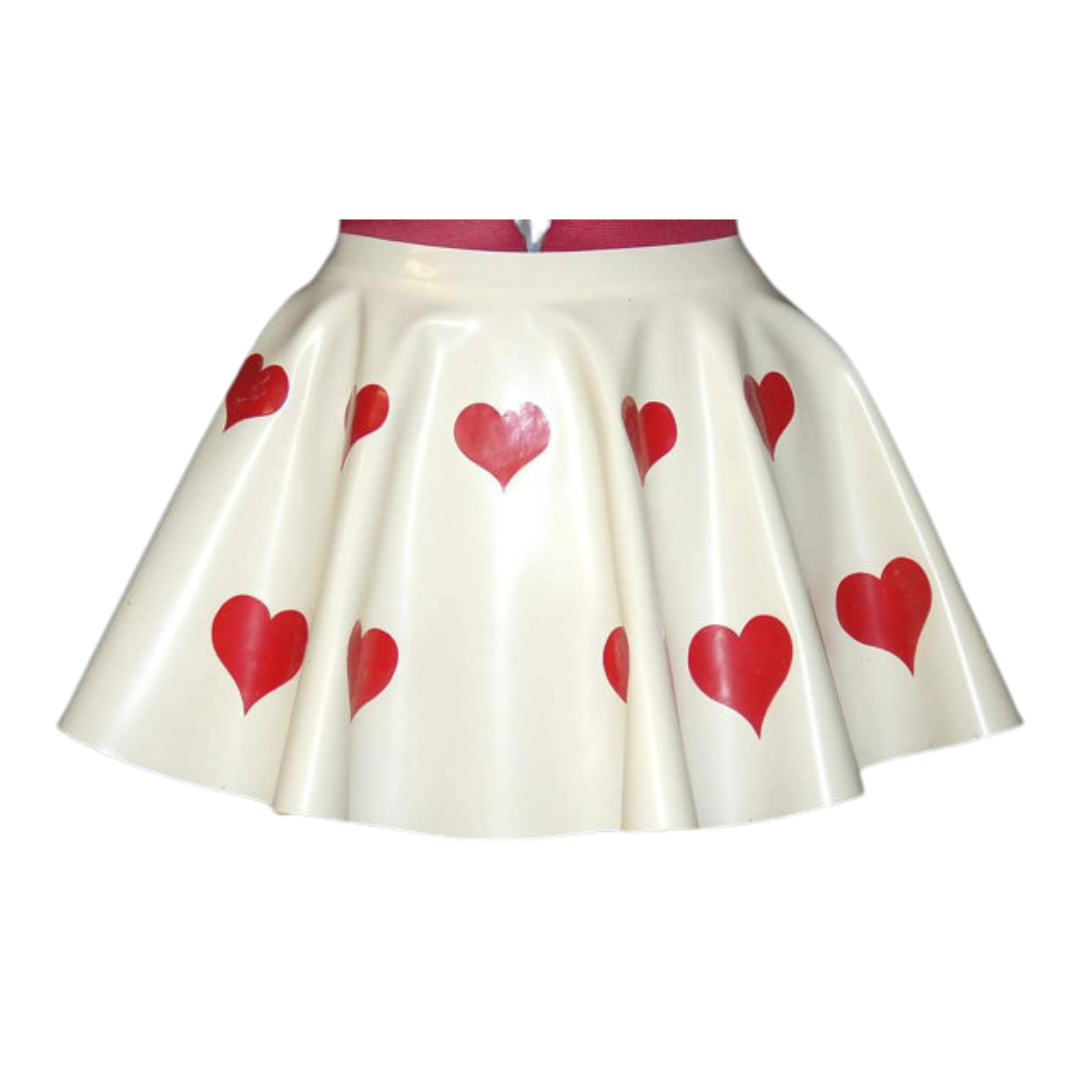 A white latex skirt with hearts appliques.