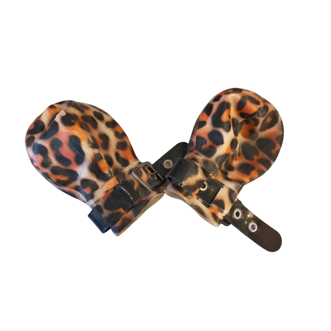 A pair of leopard print ball mitts with black straps and silver coloured buckles.