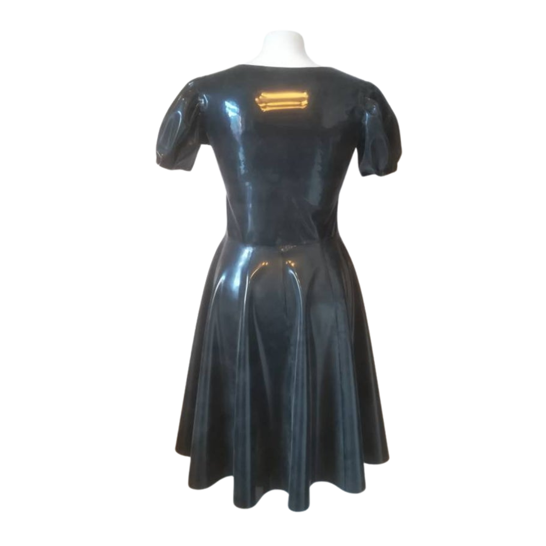 The back of a scoop neck puff sleeve latex dress. The black dress is a fit and flare style.