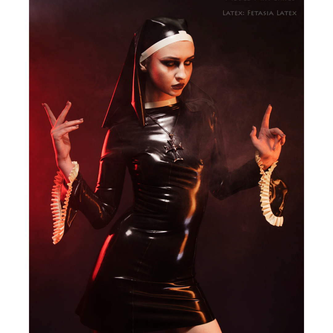 A short latex nun dress with bell sleeves that features white frill trim.