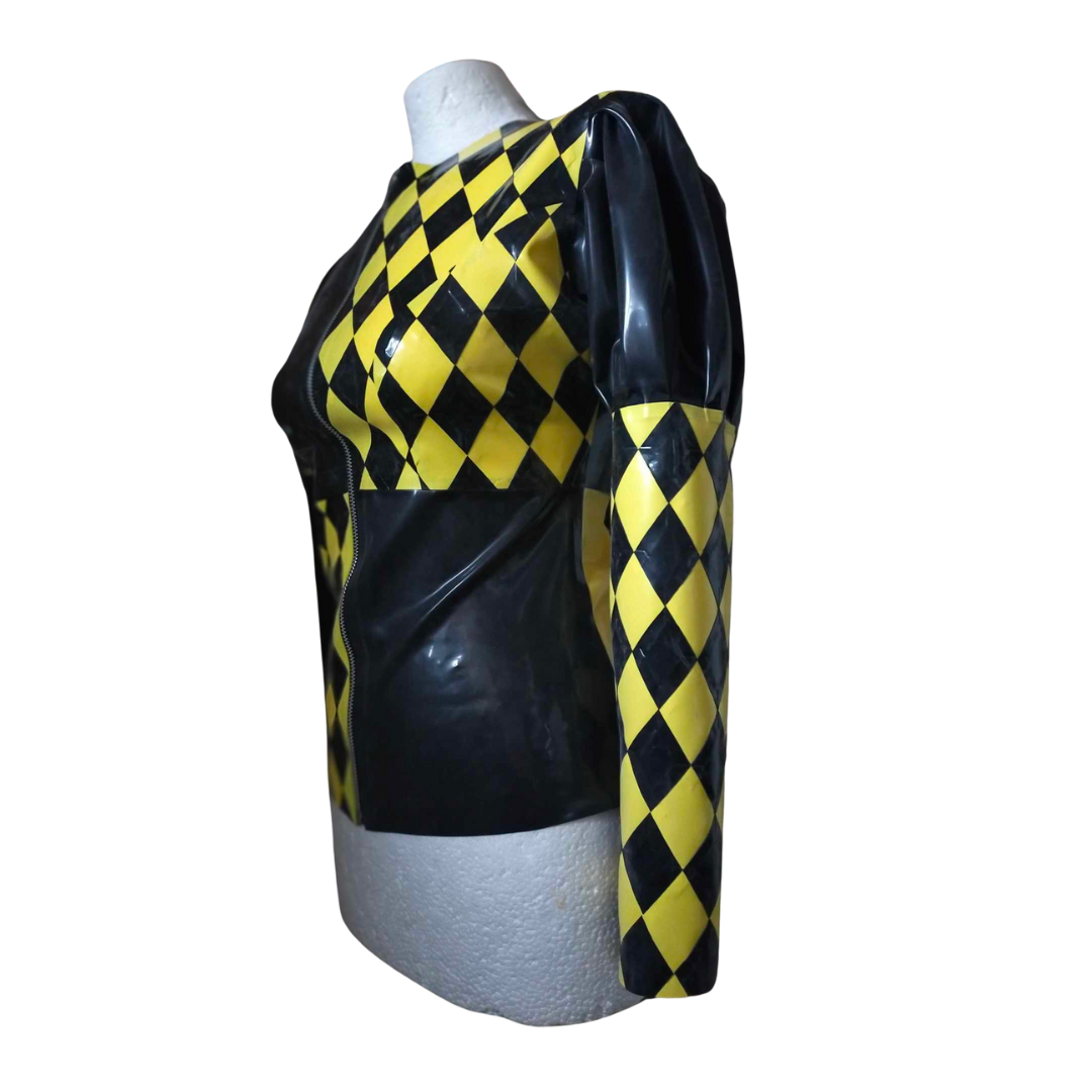 A two tone diamonds jacket in yellow and black. There are panels of solid black opposite black and yellow diamonds.