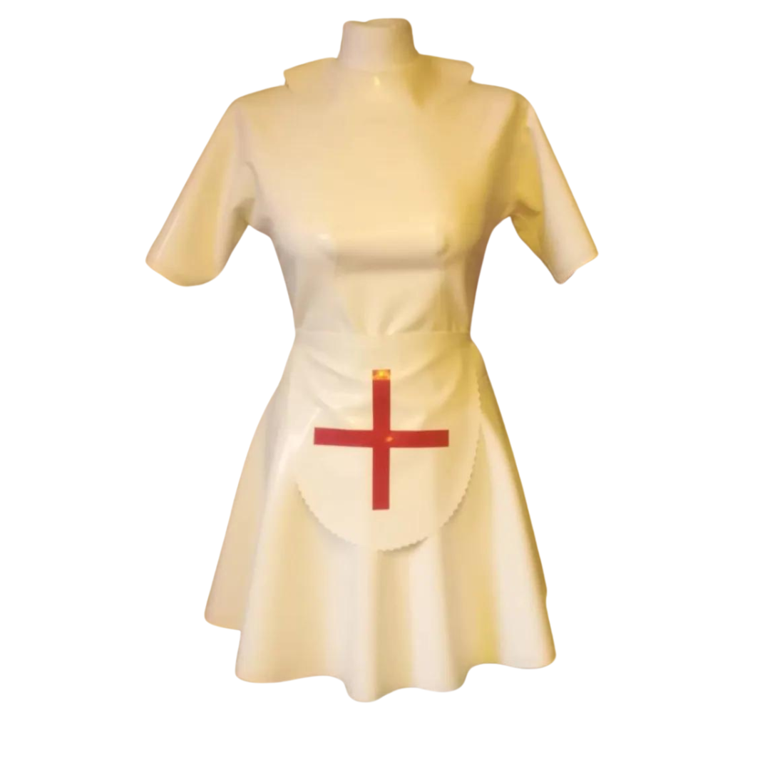 A white latex swing dress with white wavy trim edging and pan collar. The short sleeve dress has matching white apron and cap with red cross.
