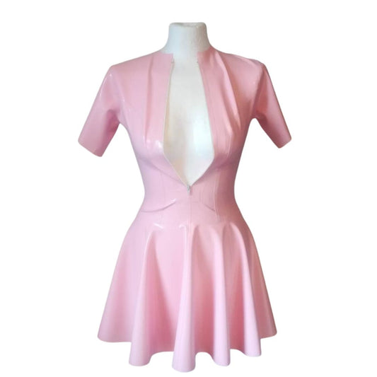 A baby pink zip front swing dress.