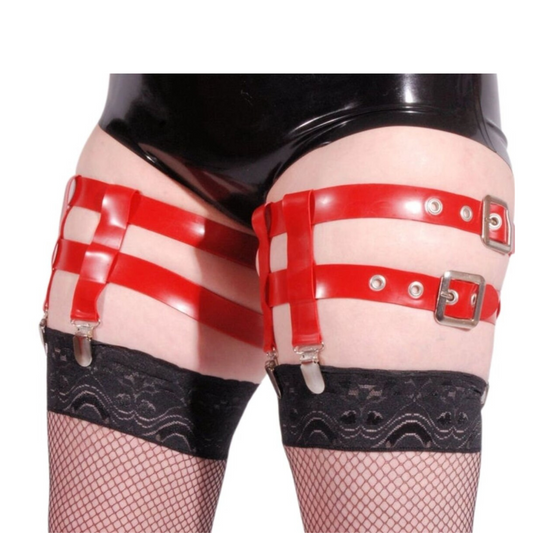 A red latex suspender belt with double straps. They fasten with silver coloured square buckles, with a row of eyelets.