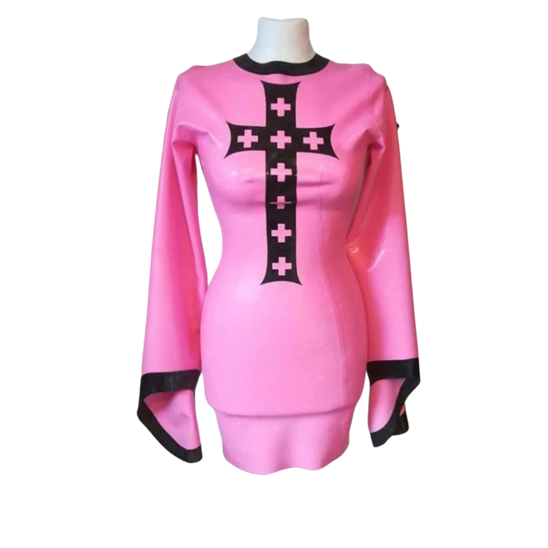 A bubble gum pink latex dress with a large black gothic cross applique and black trim.