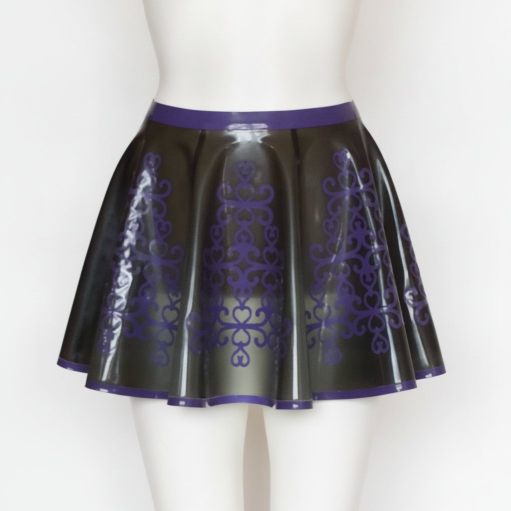 A shiny translucent black mini skater skirt with a purple waistband and purple damask-style patterns, displayed on a white mannequin against a white background.