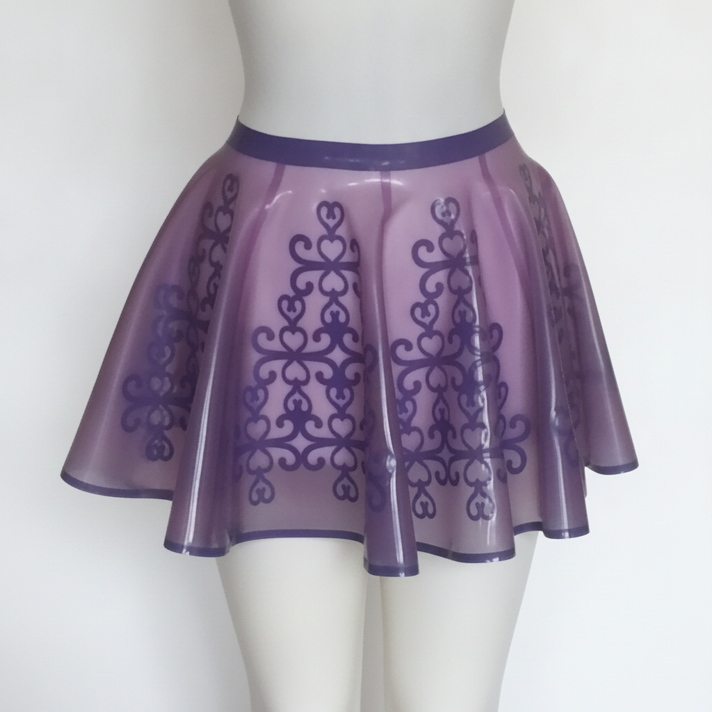 A sheer lavender purple latex skirt with a darker purple damask pattern and waistband, displayed on a white mannequin torso against a white background.
