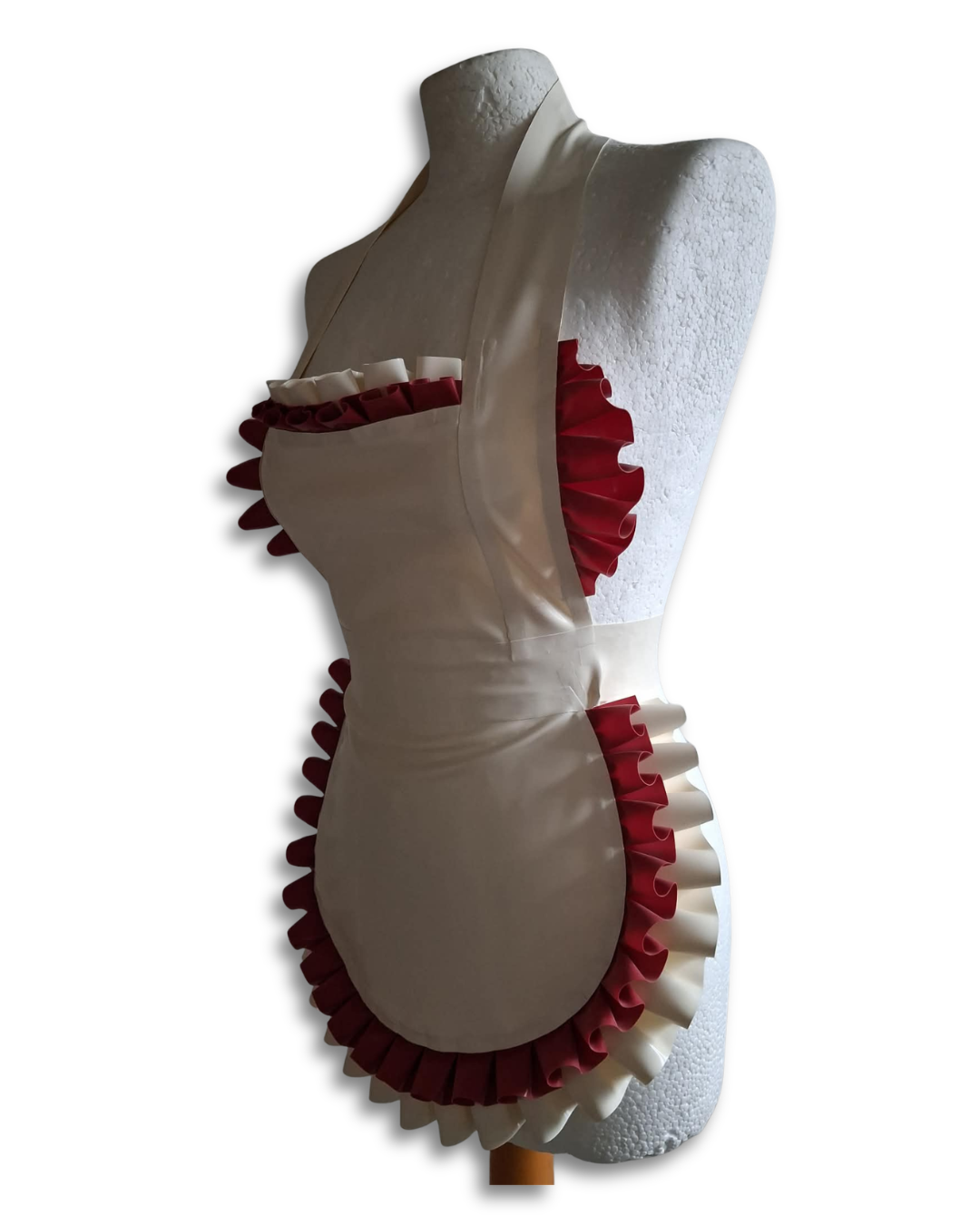 White latex apron with red trim on a mannequin against a white background