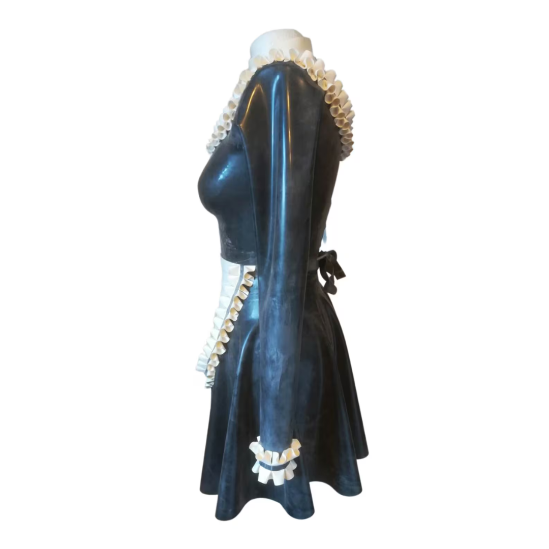 Black and white latex maid outfit on a mannequin against a white background. The collar, sleeves and apron feature double rows of frills.