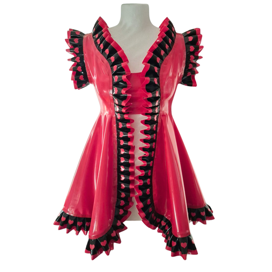 A shiny red latex dress with black heart-patterned trim, displayed on a white mannequin torso against a plain white background.