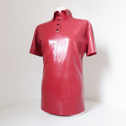 A glossy red latex short-sleeve polo shirt displayed on a white mannequin torso against a plain white studio background.