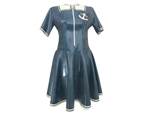 Metallic blue latex sailor dress. It has a white front opening zip and white collar detail. The short sleeves and swing skirt hems are trimmed with two rows of white latex.