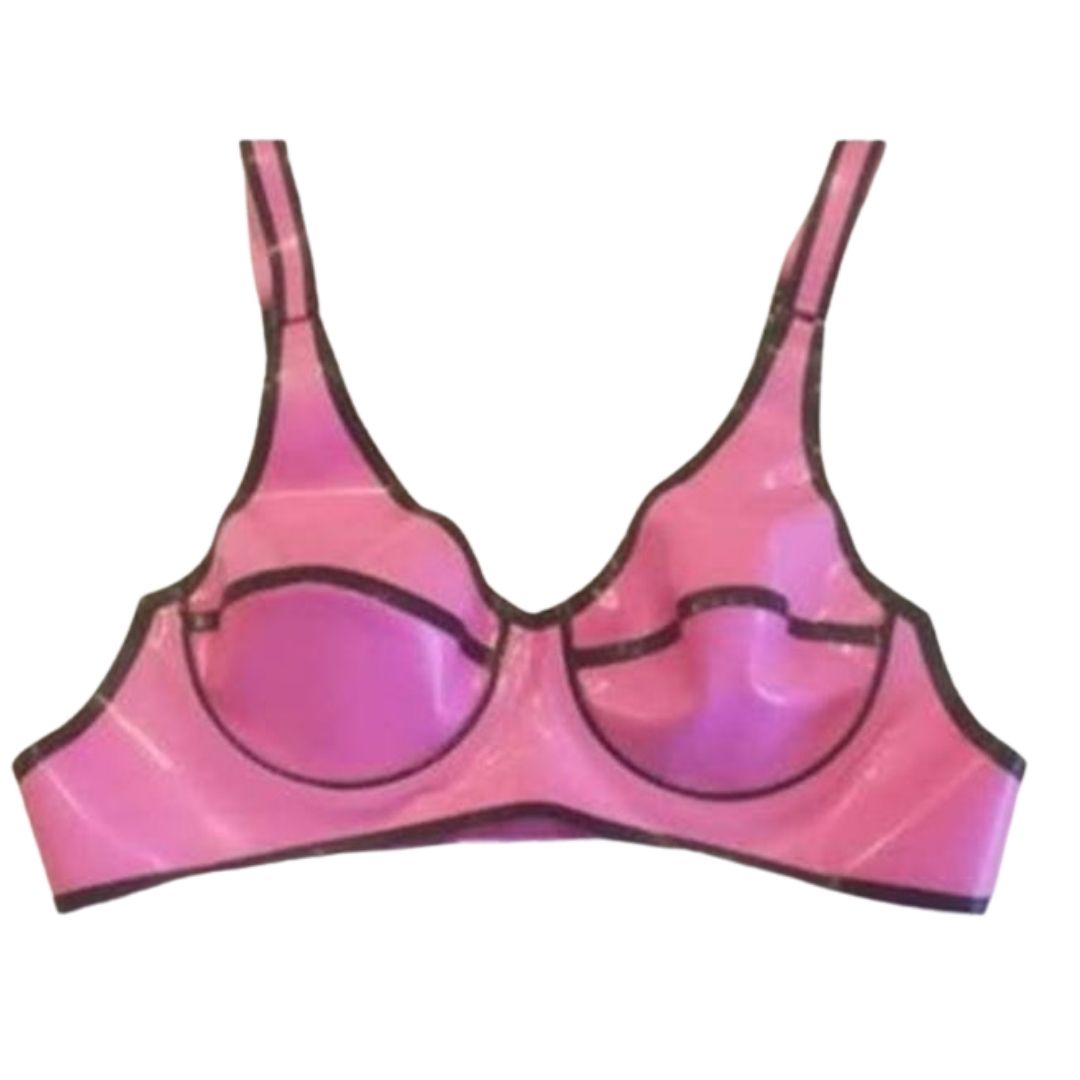 A bubble gum pink underwired  latex bra with black trim detail.