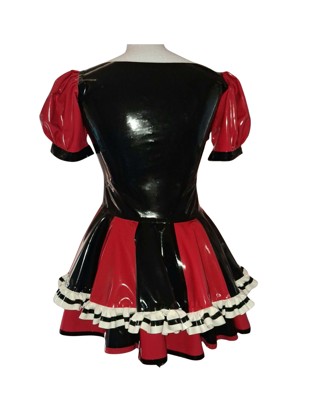 A glossy black and red latex costume dress displayed on a mannequin torso against a plain white background. The dress features a shiny black bodice with red puff sleeves, a matching pleated skirt in black and red, and a ruffled hem with white and black trim.