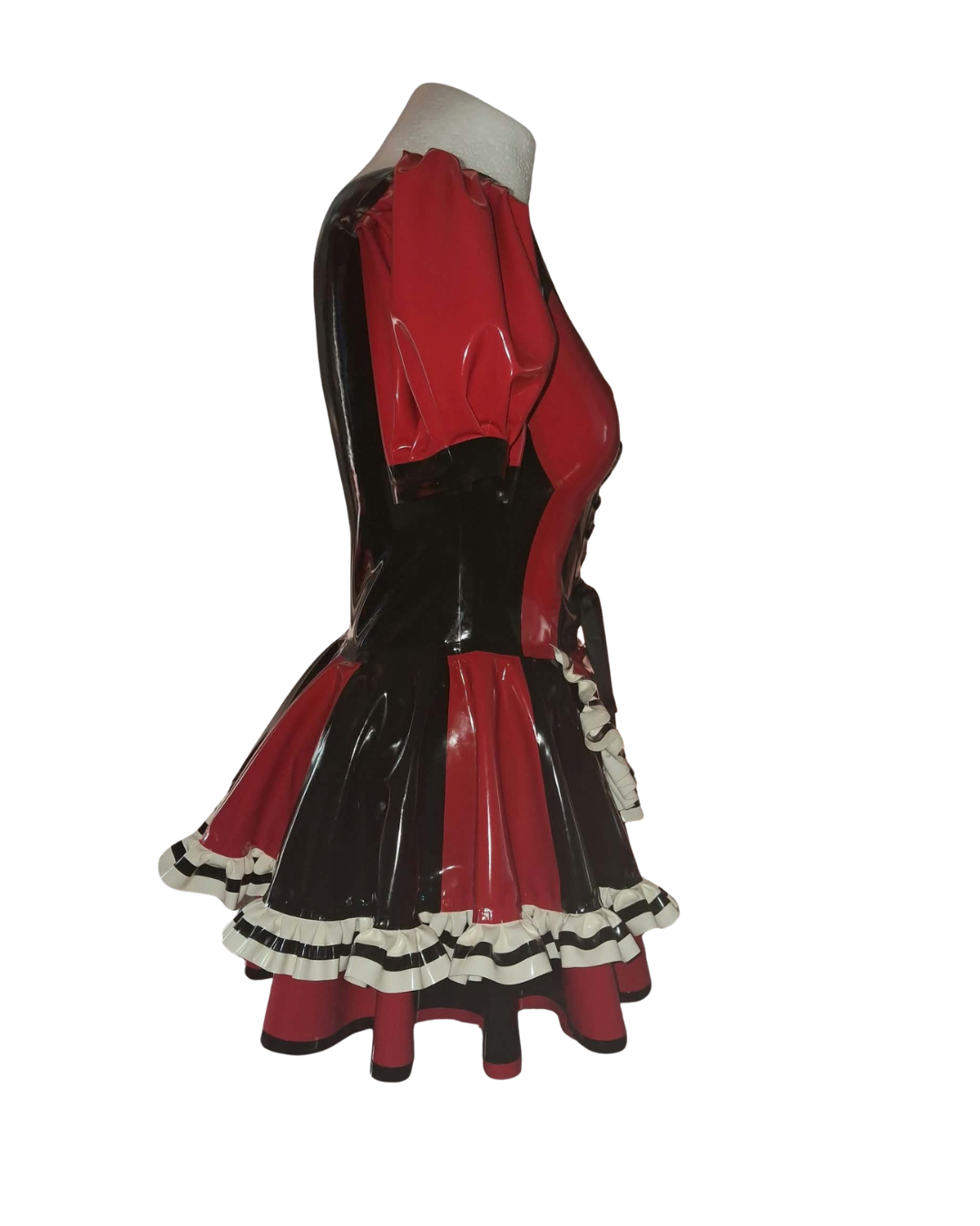 A red and black glossy latex costume dress displayed on a mannequin torso against a plain white background.