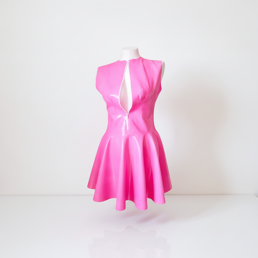 A bright pink sleeveless latex dress displayed on a white mannequin torso against a clean white background.