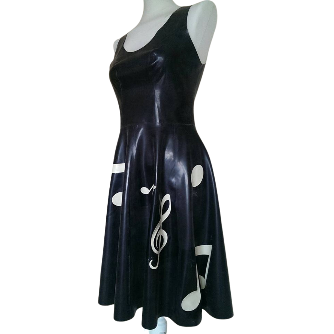 A black latex knee length latex swing dress. It has a scoop neck line and is adorned with white musical notes appliques.