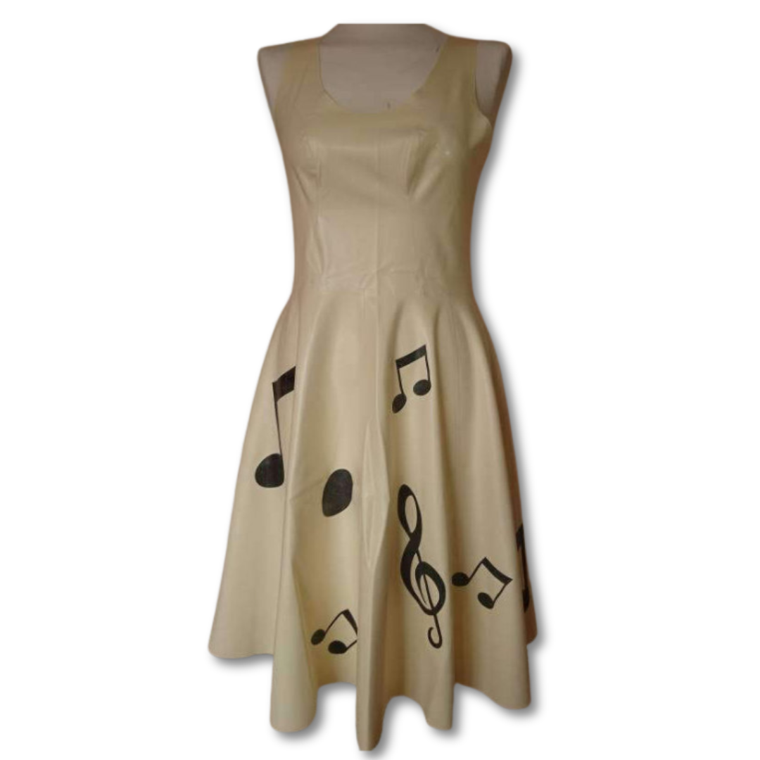 A white latex fit and flare sleeveless dress. It has a scoop neck line and the bottom of the dress is decorated with large black musical notes appliques.